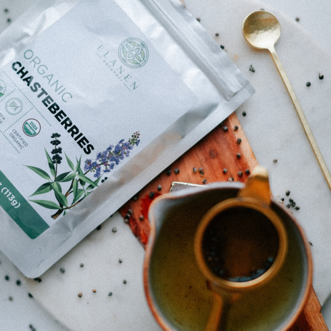 Elanen Organic Chasteberrries package on a table with a cup and spoon.
