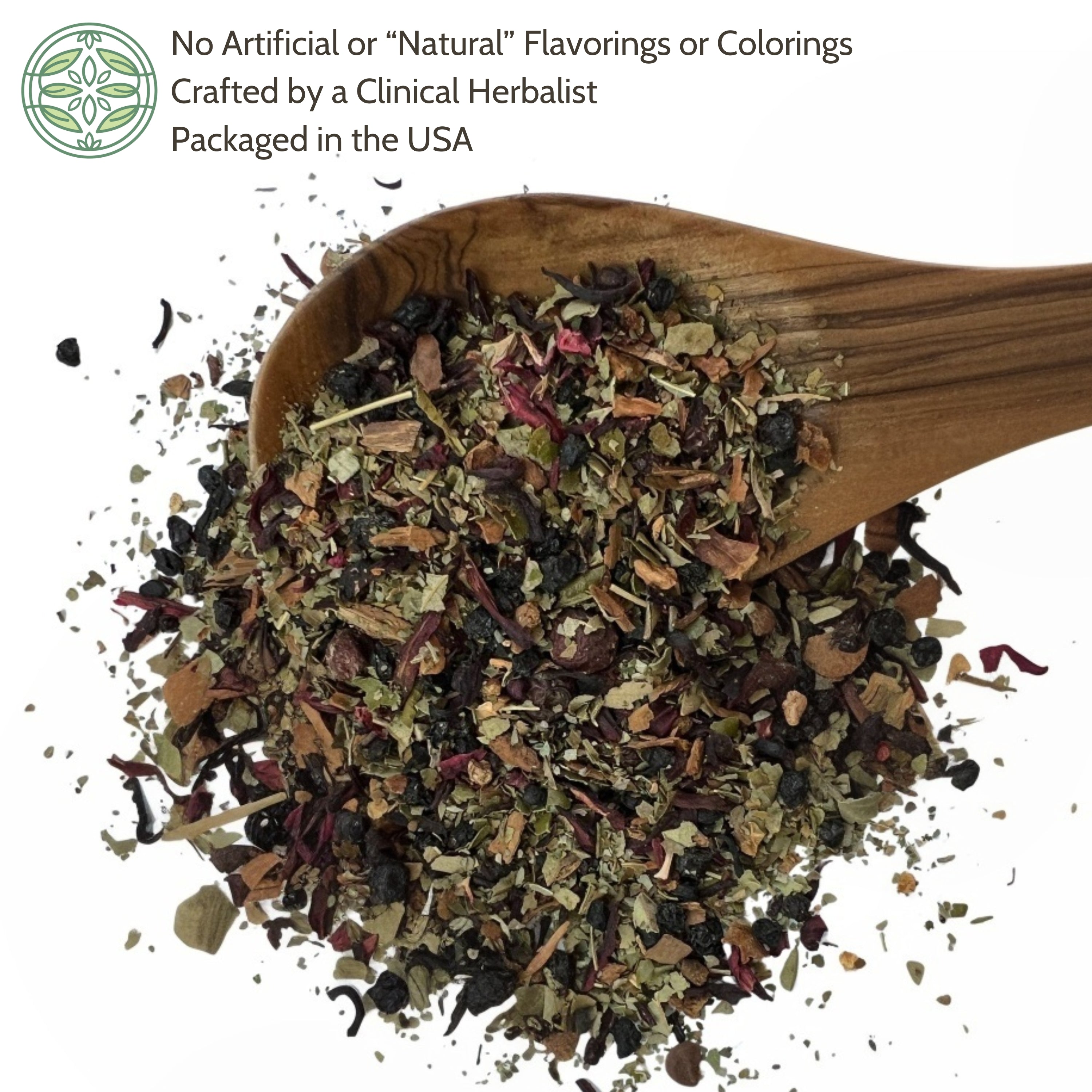 Wooden spoon filled with dried herbs on a white background