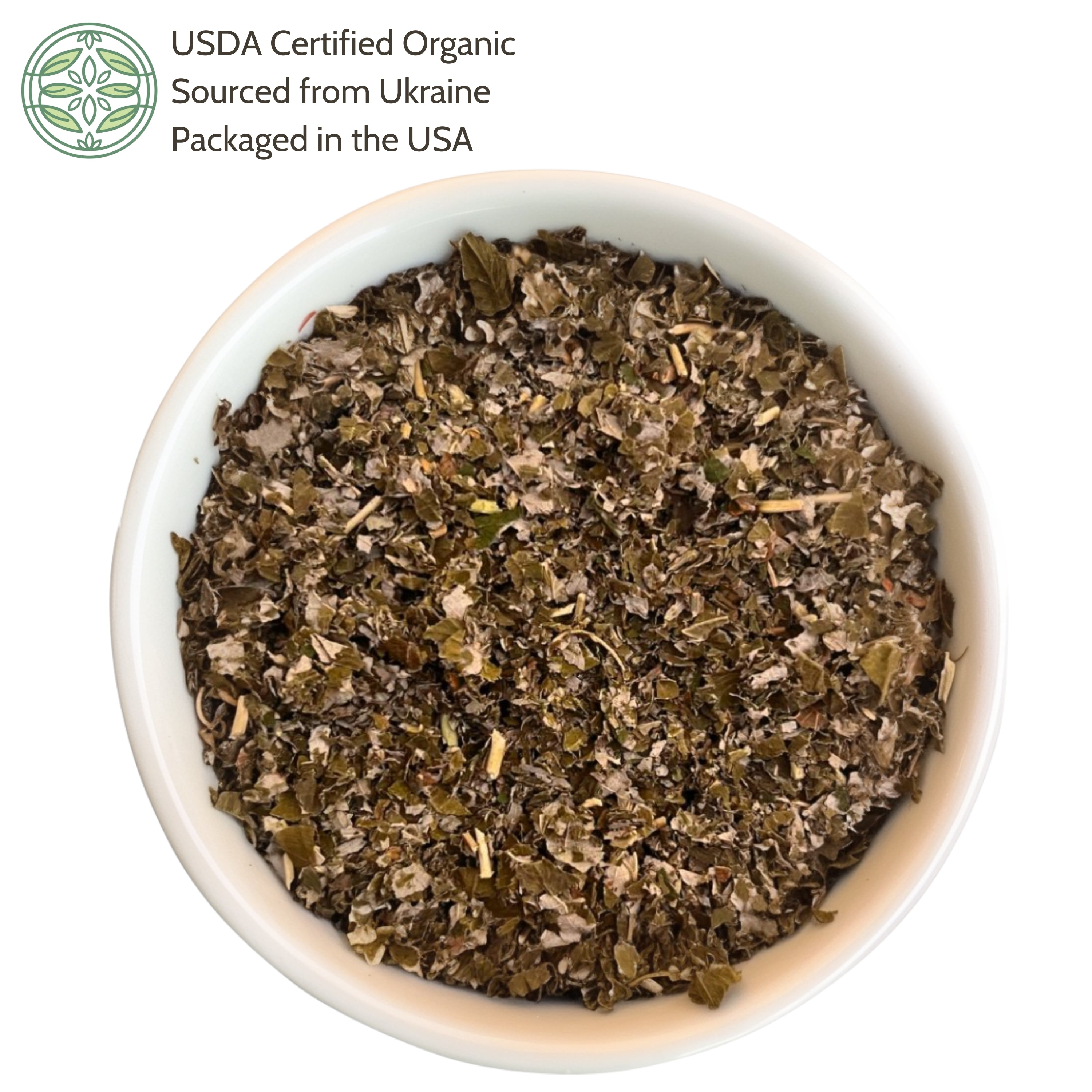 Herbal mix in a white bowl with USDA Certified Organic label on a white background