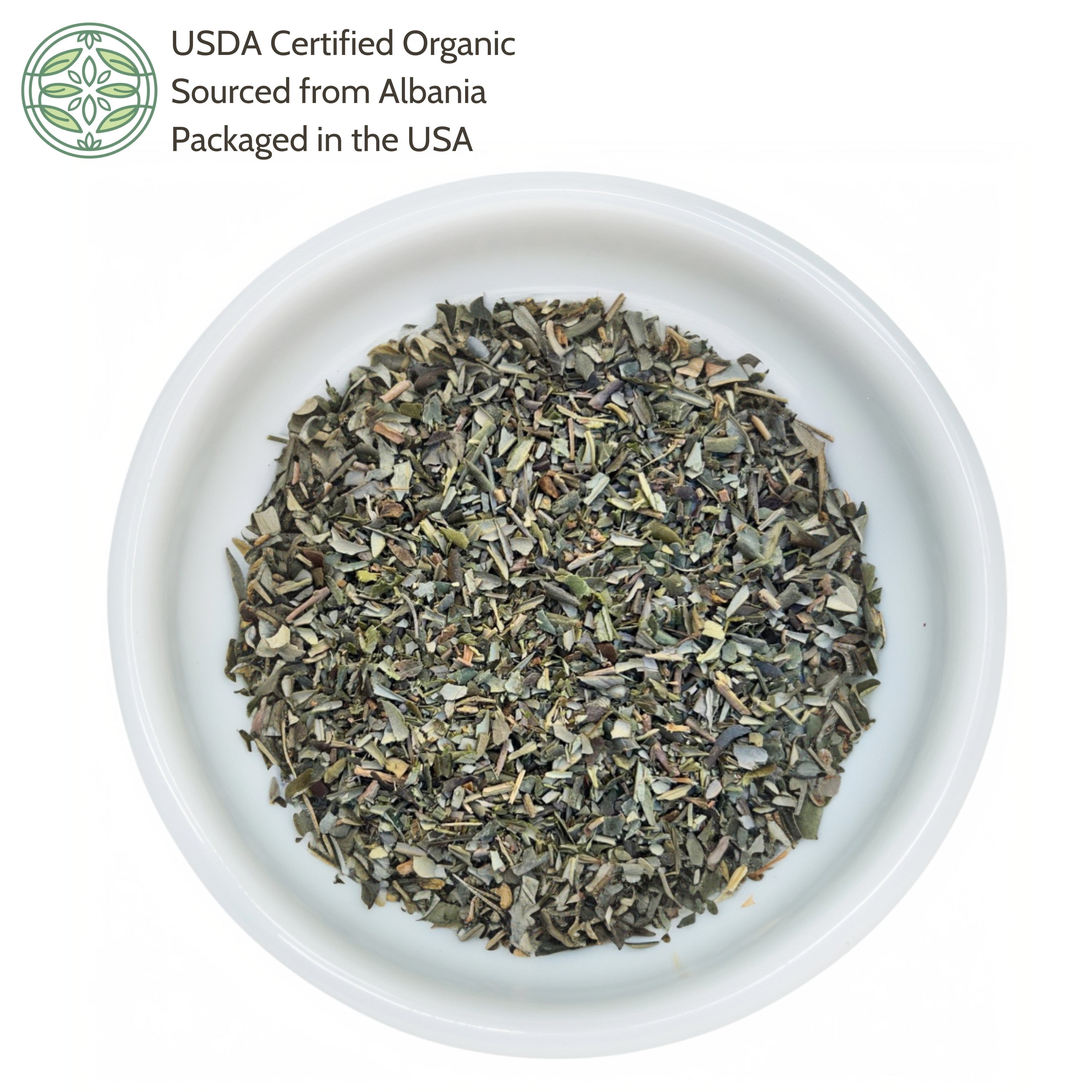 Dried herbs in a white bowl with USDA Certified Organic label on a white background