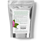 Silver package with a label featuring a pink clover flower and text on a white background