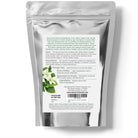 Silver package with white label featuring text and a green leaf graphic on a white background