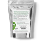 Silver package with text and green leaf illustration on a white background
