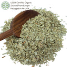 Dried eucalyptus with a wooden spoon on a white background, USDA Certified Organic label visible.