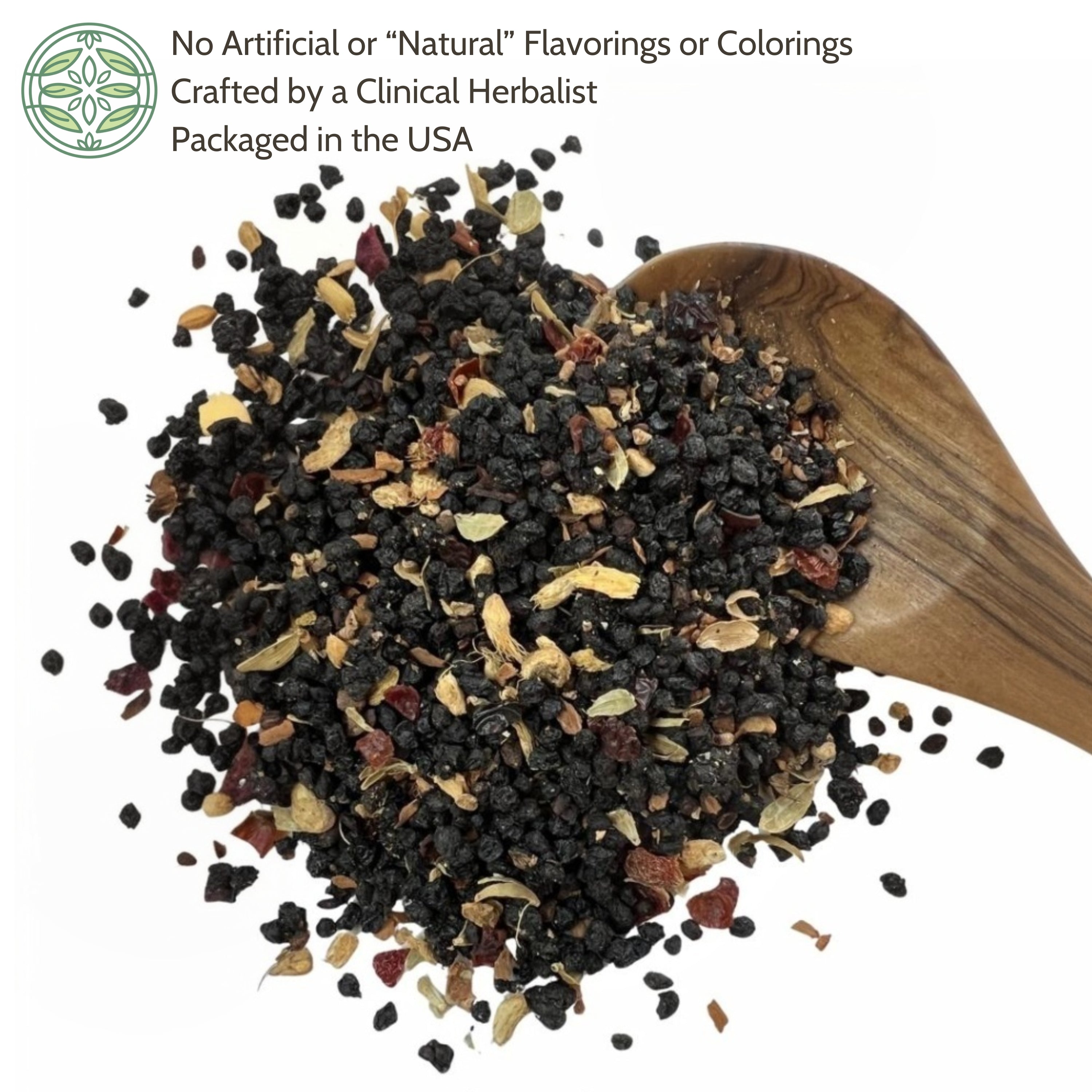 elderberry syrup mix on a wooden spoon