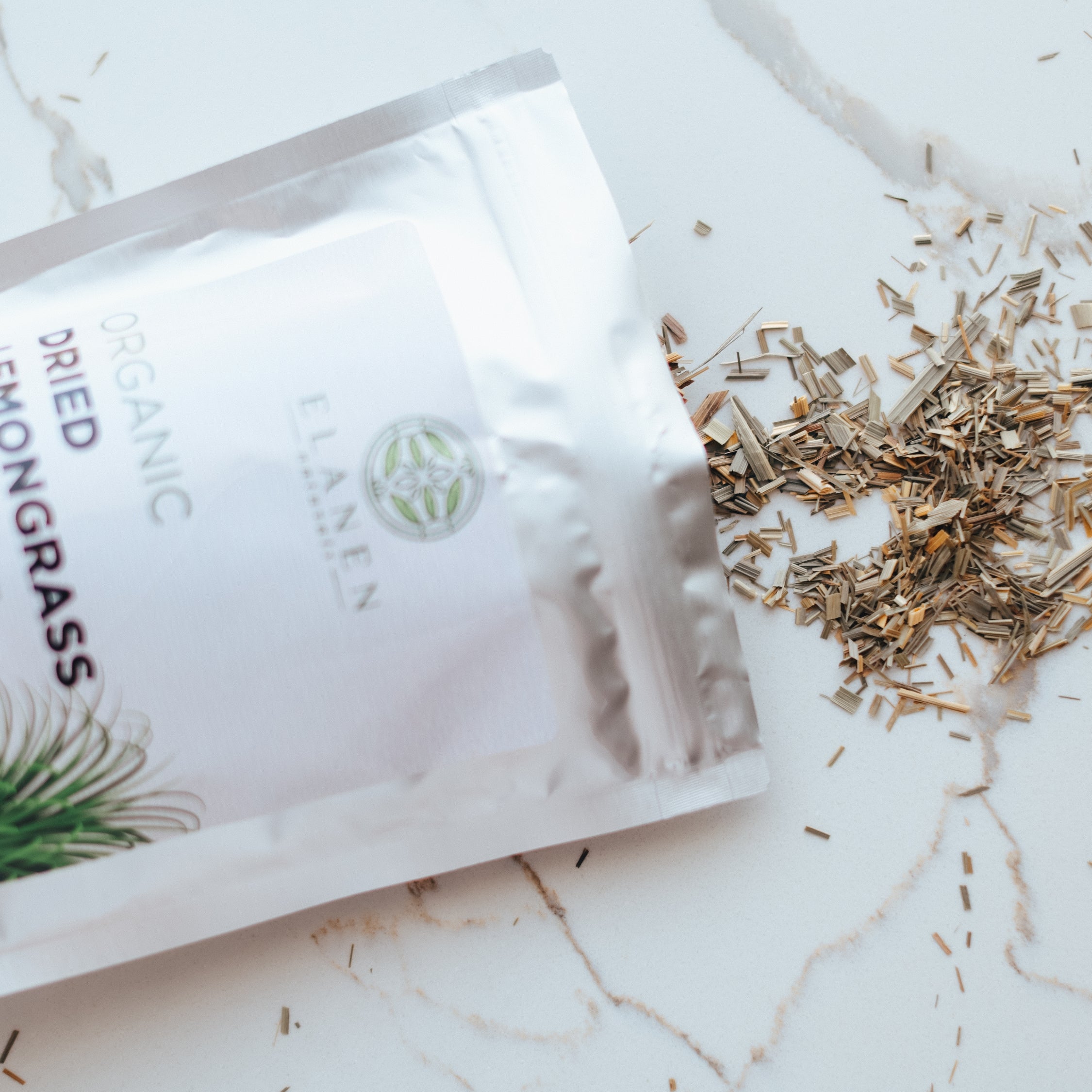 Bag of organic dried lemon grass on a marble surface